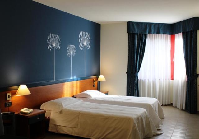 Domus Grand Hotel ريندي المظهر الخارجي الصورة