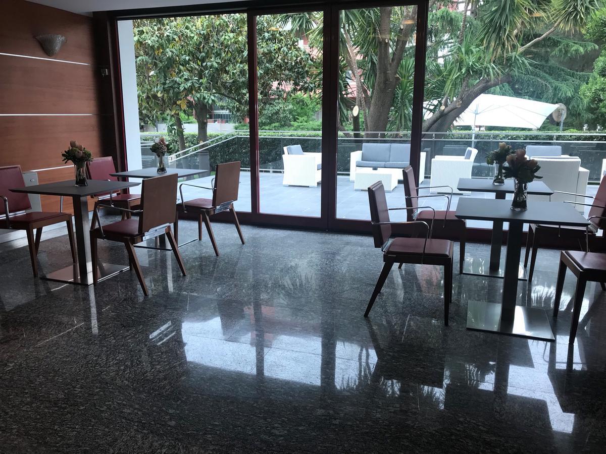 Domus Grand Hotel ريندي المظهر الخارجي الصورة