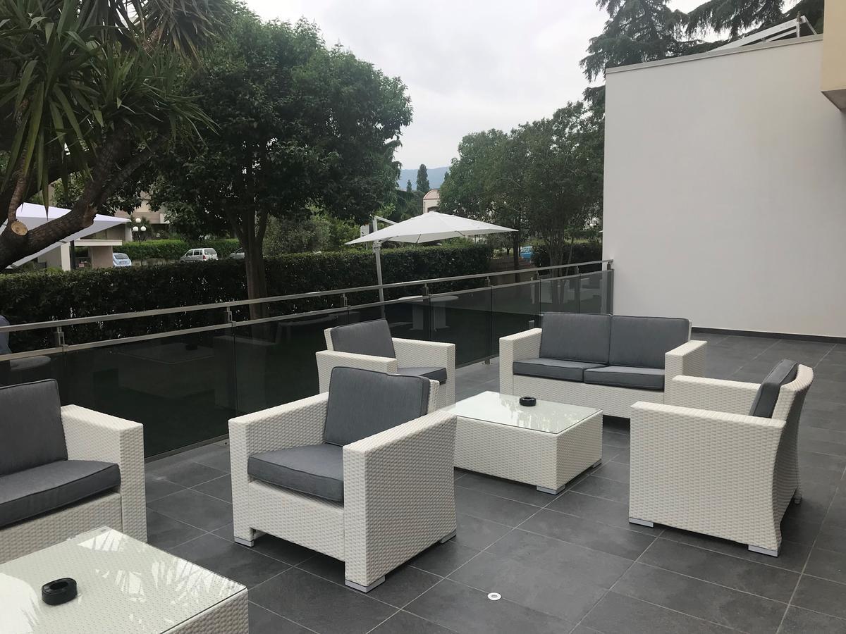 Domus Grand Hotel ريندي المظهر الخارجي الصورة
