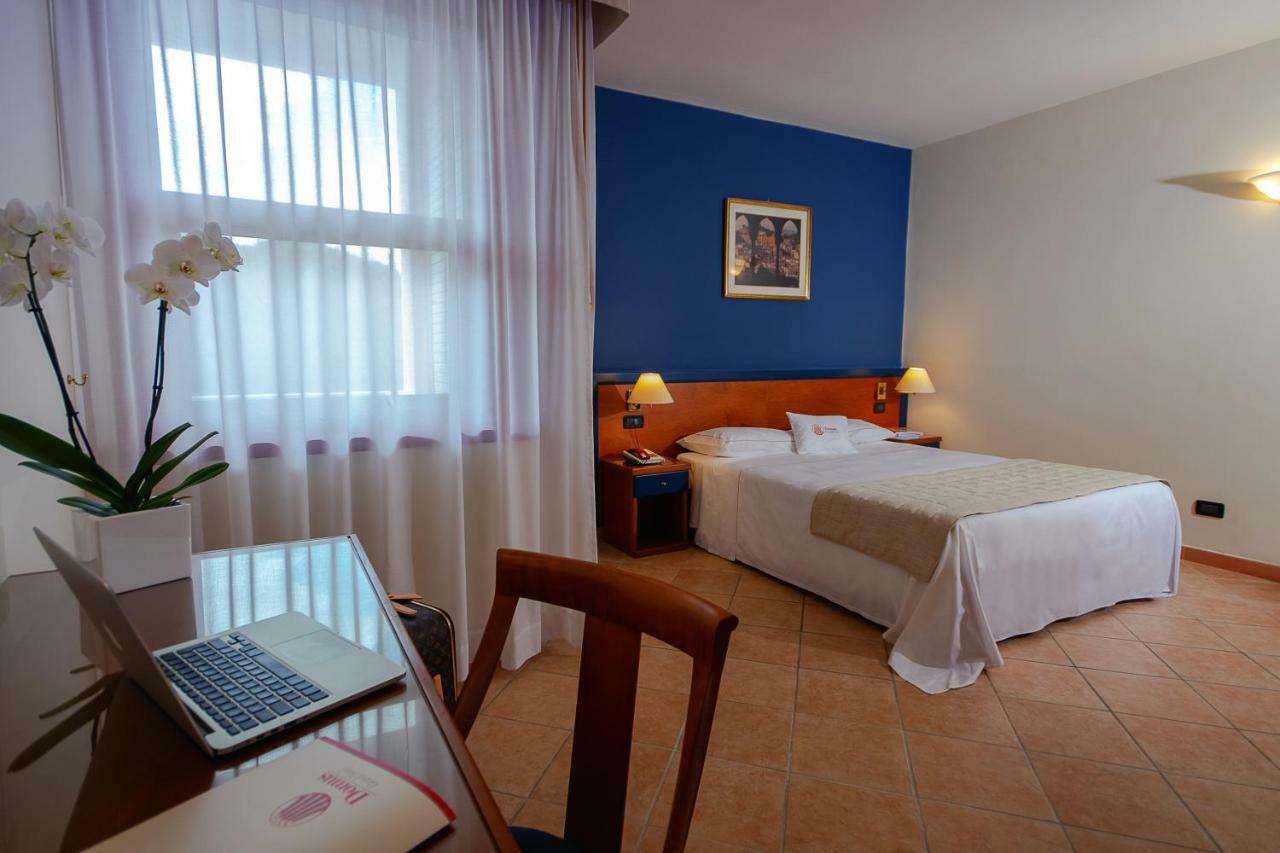 Domus Grand Hotel ريندي المظهر الخارجي الصورة